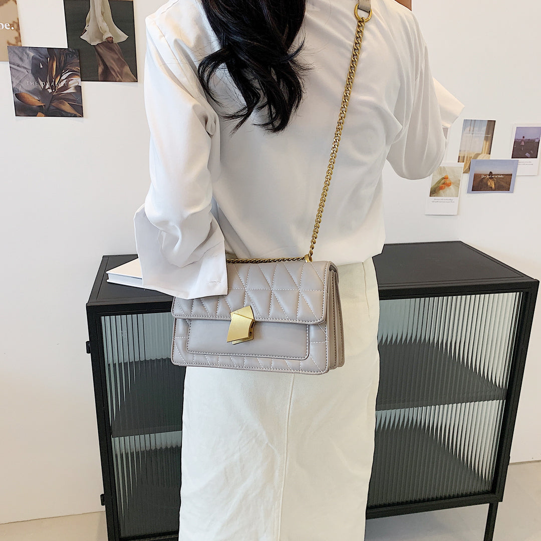 Modern abstract metal closure quilted PU leather crossbody bag