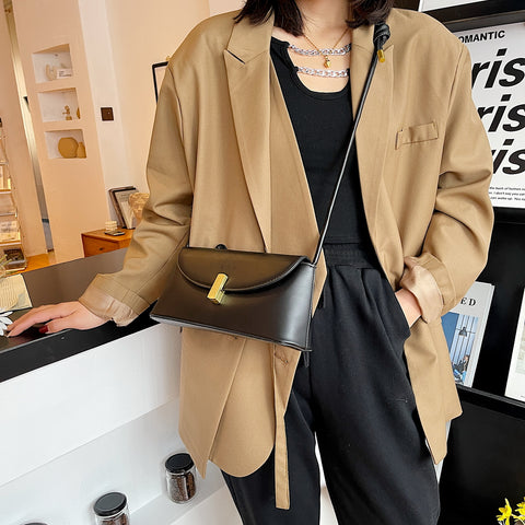 Metal clasp flap knotted strap PU leather shoulder bag