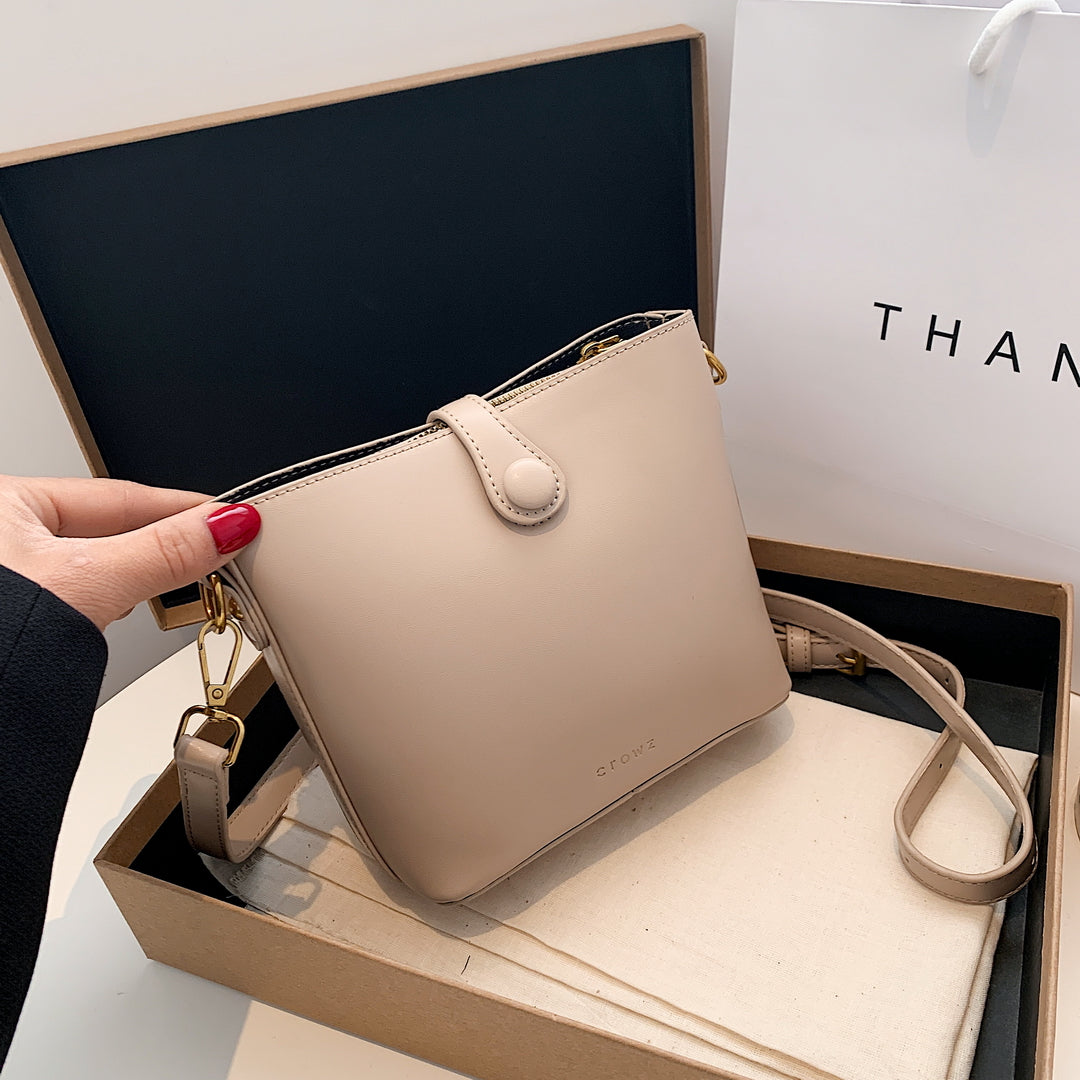 Modern strap style PU leather bucket bag