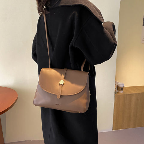 Metal stud strap flap PU leather crossbody bag
