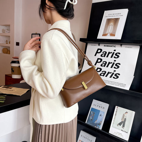 Metal clasp flap knotted strap PU leather shoulder bag