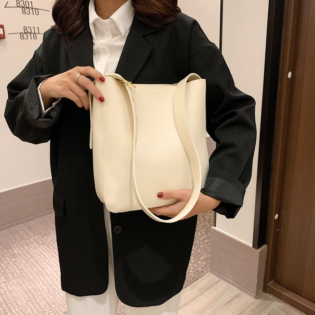 簡約百搭可調肩帶設計子母款仿皮斜背包