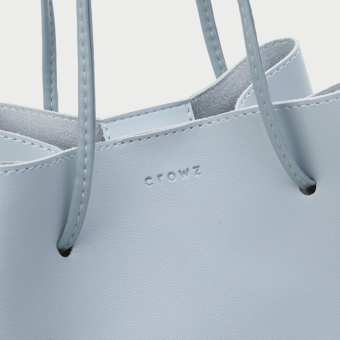 Modern minimalistic smooth PU leather bucket bag
