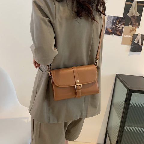 Retro buckle strap flap style PU leather crossbody bag
