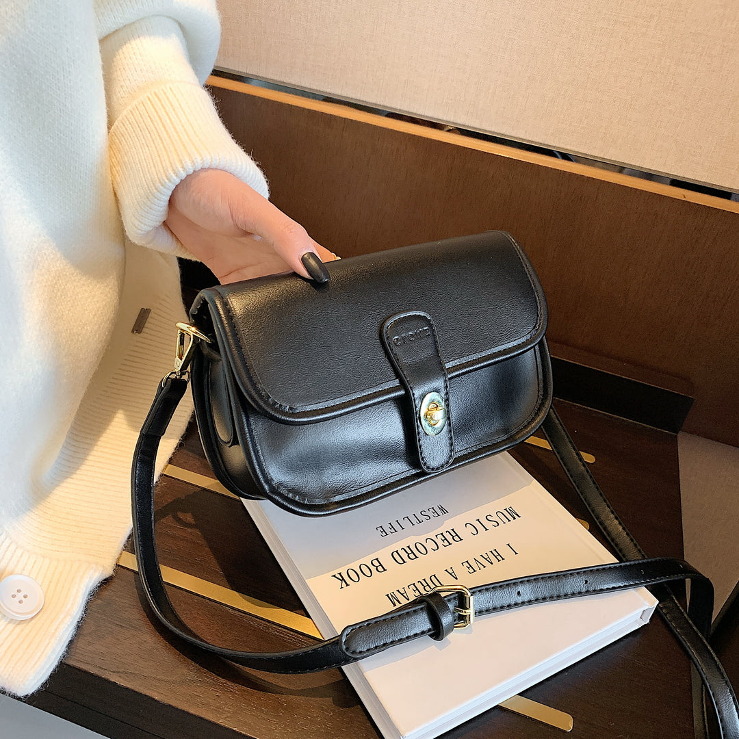 Metal turn-lock strap saddle style PU leather crossbody bag