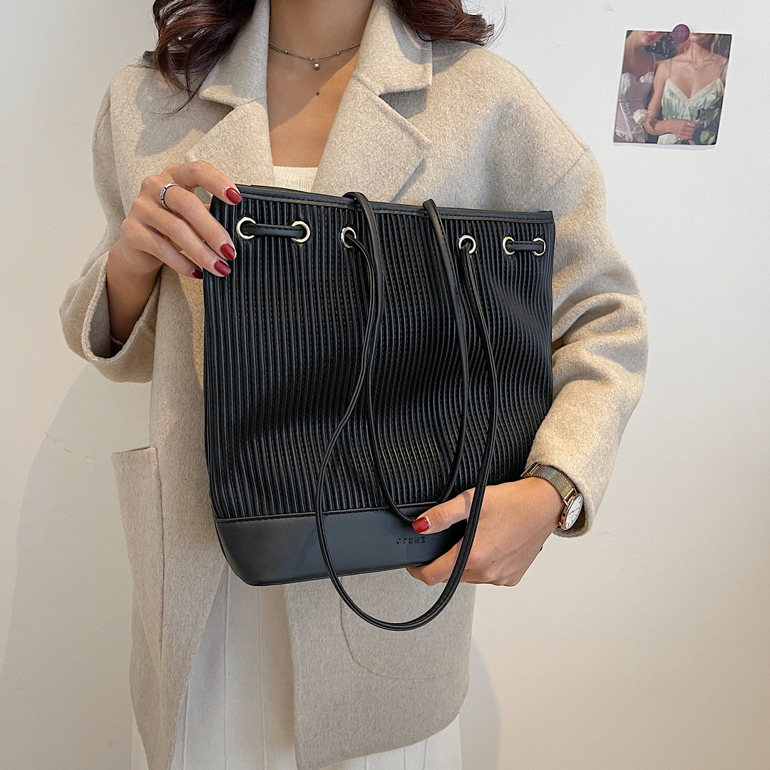 Eyelet strap detail tactile pleated PU leather shoulder bag